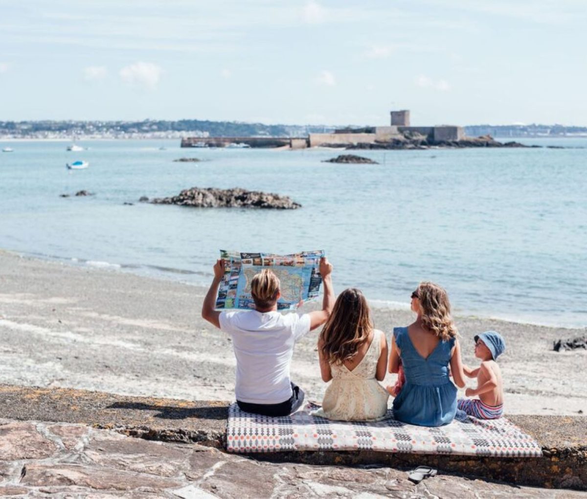 Family having a picnic at Belcroute Bay, Jersey