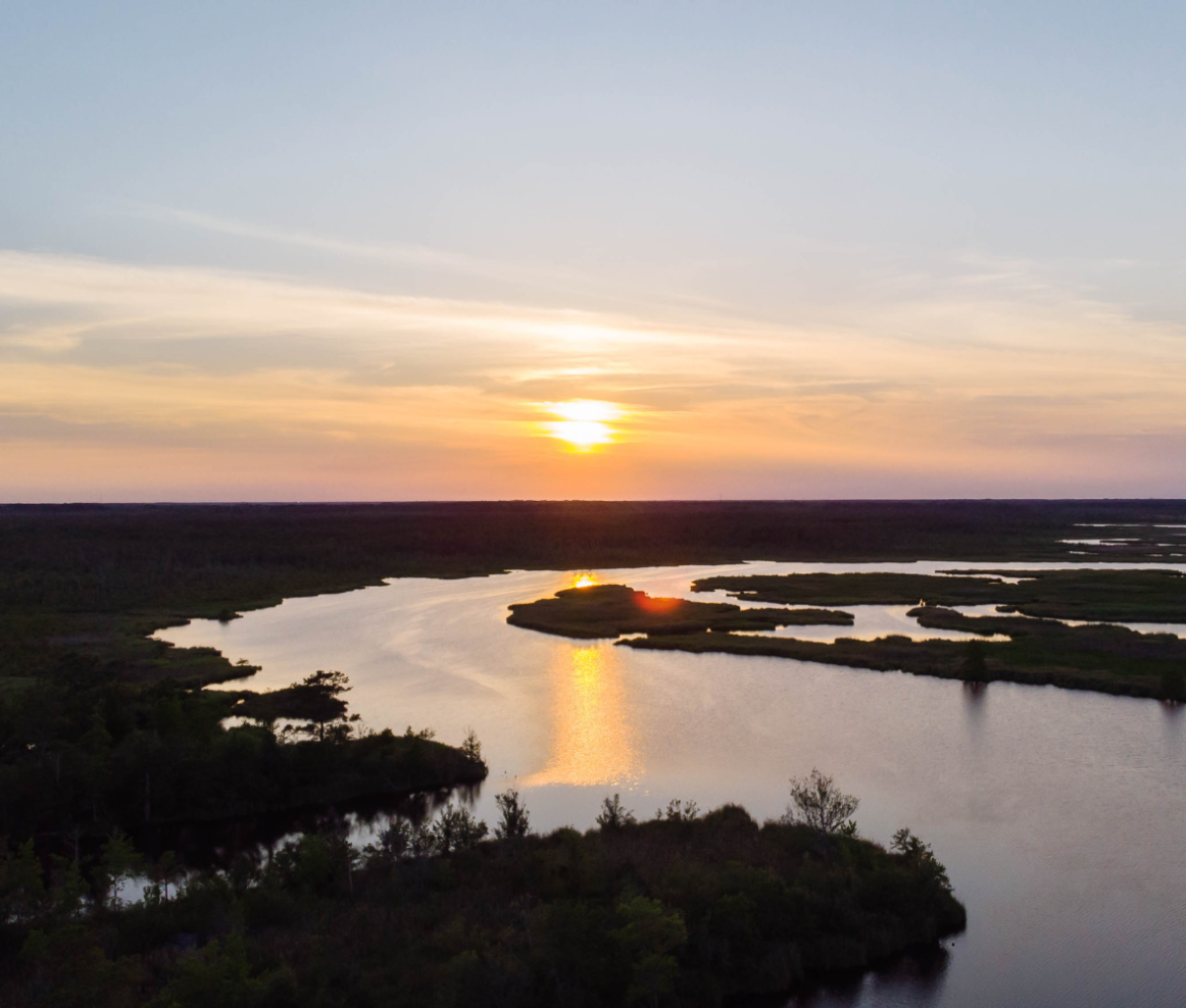 North Landing River at sunset at Pungo Ferry Bridge, Virginia Beach, USA.